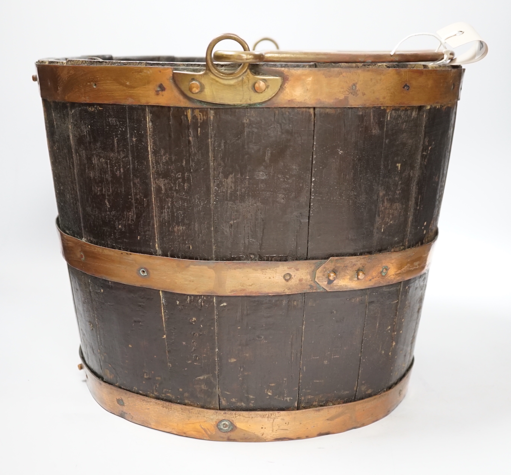 A copper bound oak bucket, 35cm diameter